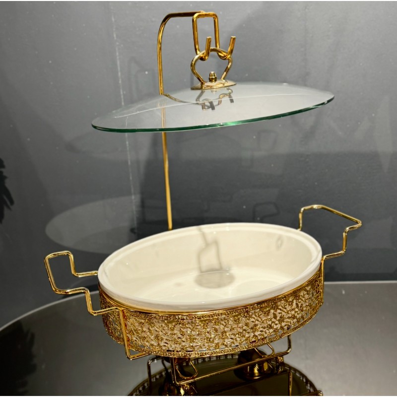 Chauffe plat en porcelaine ovale avec support doré Chauffe plat en porcelaine ovale avec support doré
